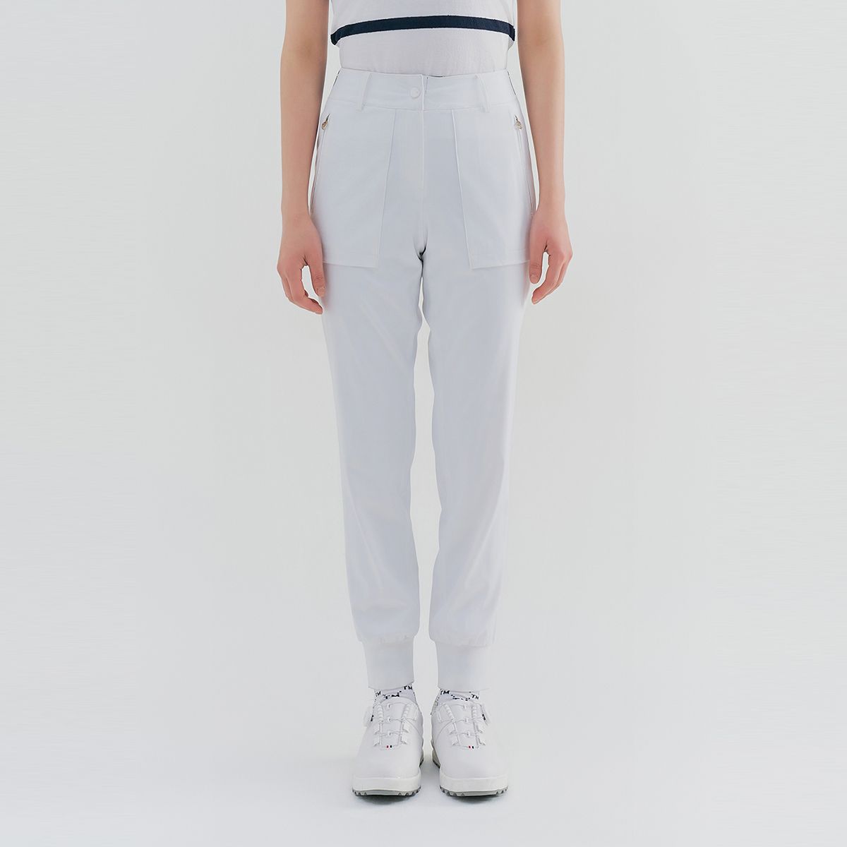 테일러메이드 어패럴(TAYLORMADE APPAREL) 여성 허리 로고 조거핏 팬츠 T8031PN6381-100