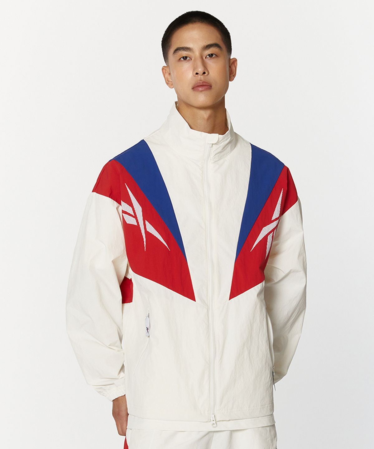 리복(REEBOK) 트윈 벡터 윈드 브레이커 - 오프 화이트