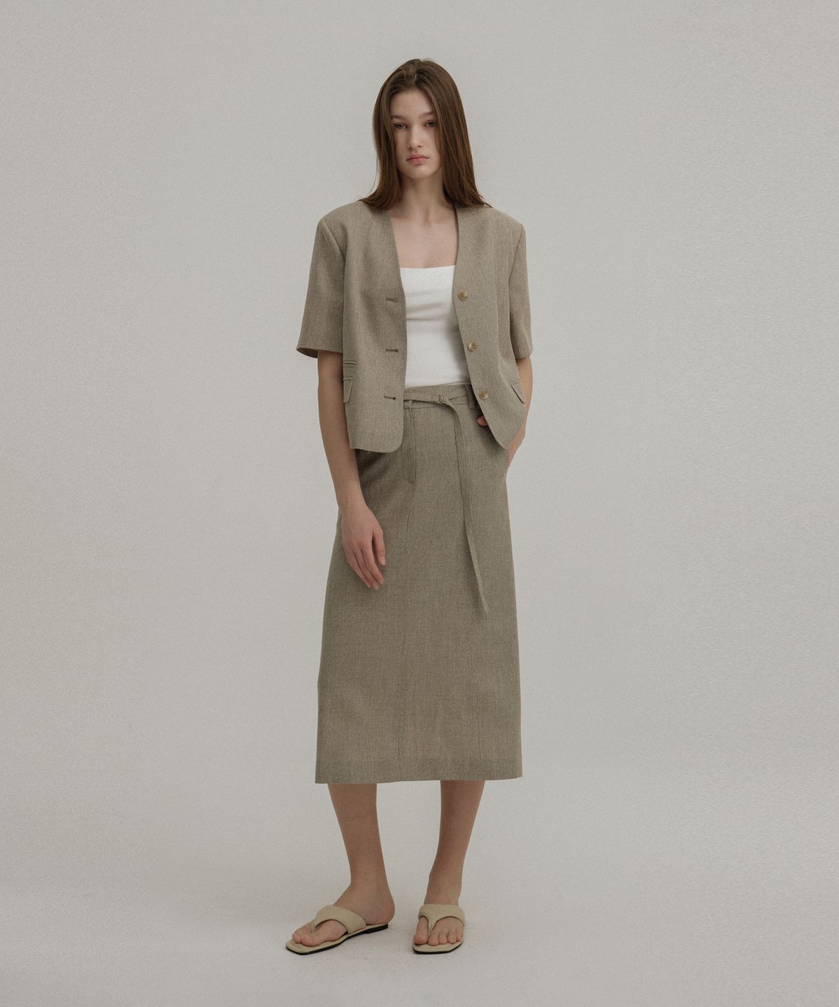 아바몰리(AVA MOLLI) BELTED H-LINE LONG SK (BEIGE)