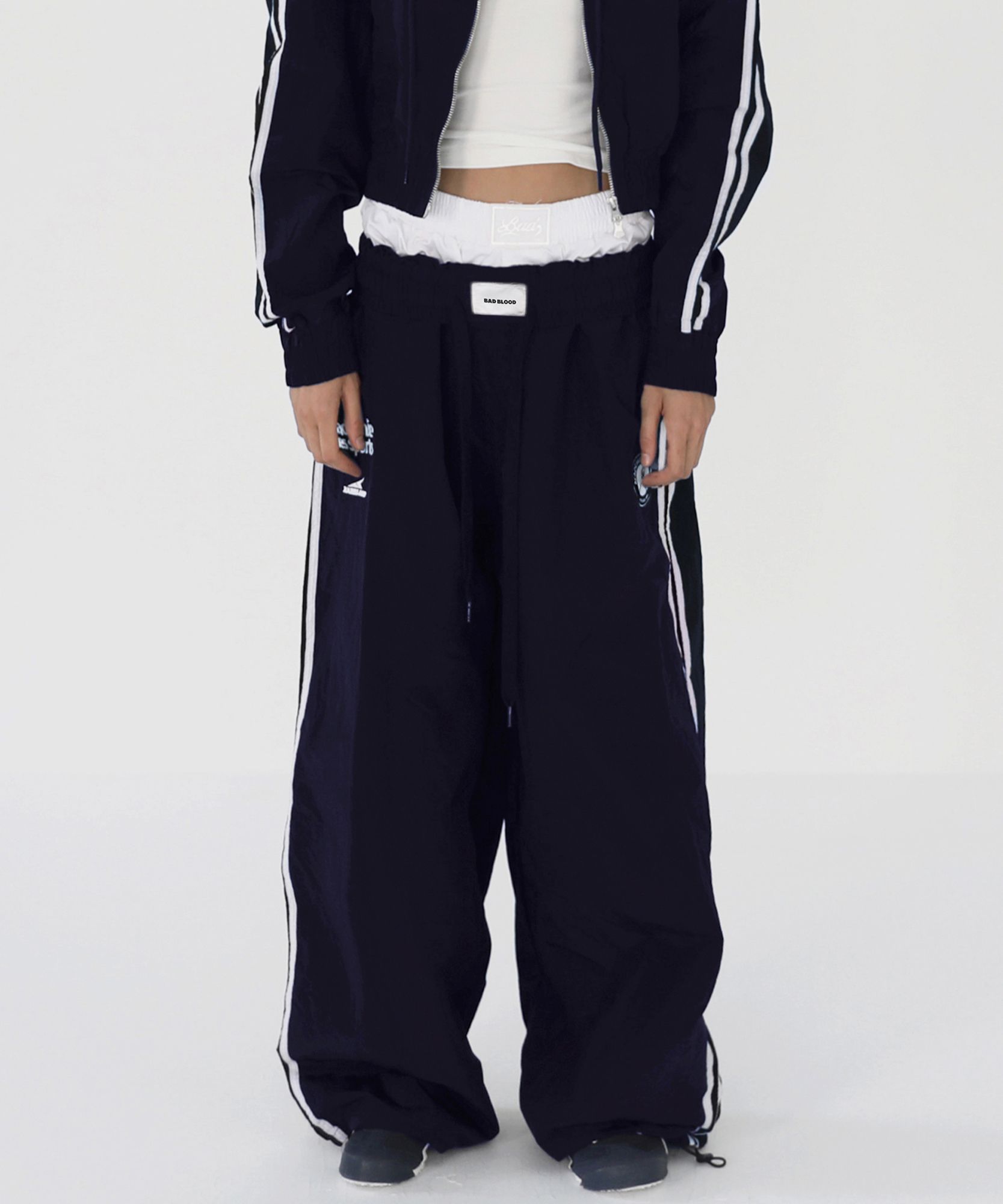 公式の店舗 MUSINSA | BADBLOOD ADS Vintage Nylon Track Pants - Navy パンツ