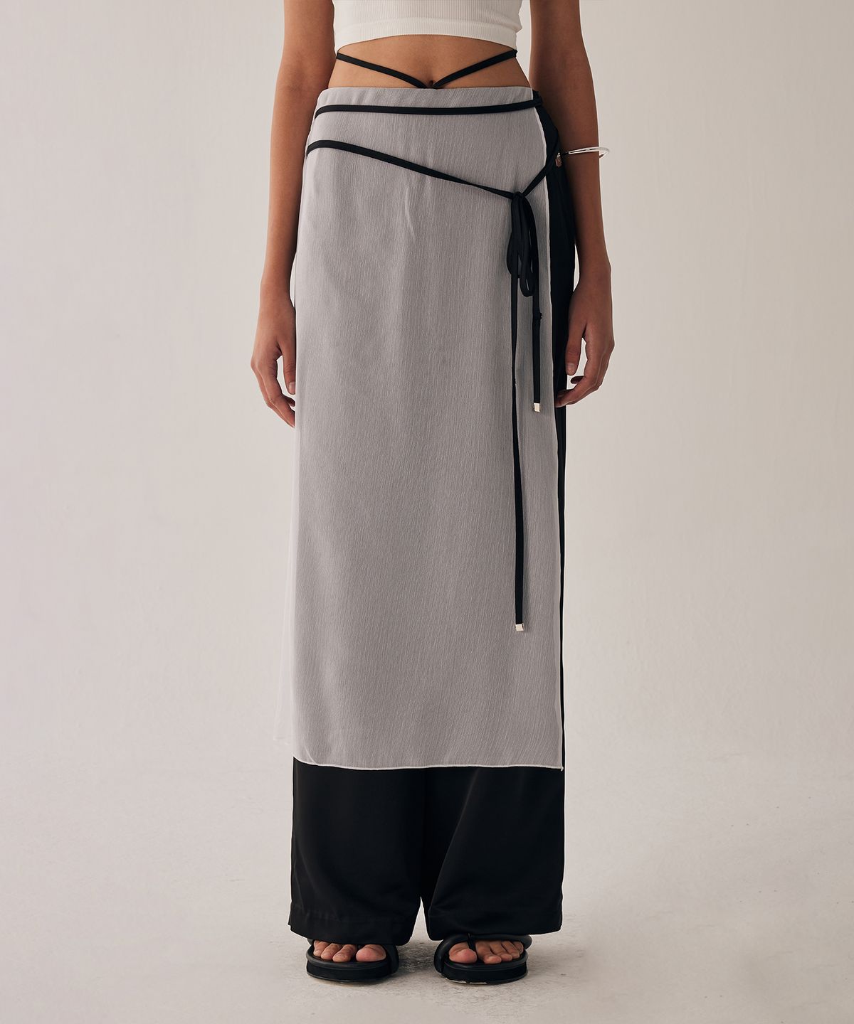 트리밍버드(TREEMINGBIRD) See-Through Strap Wrap Pants [ White ]