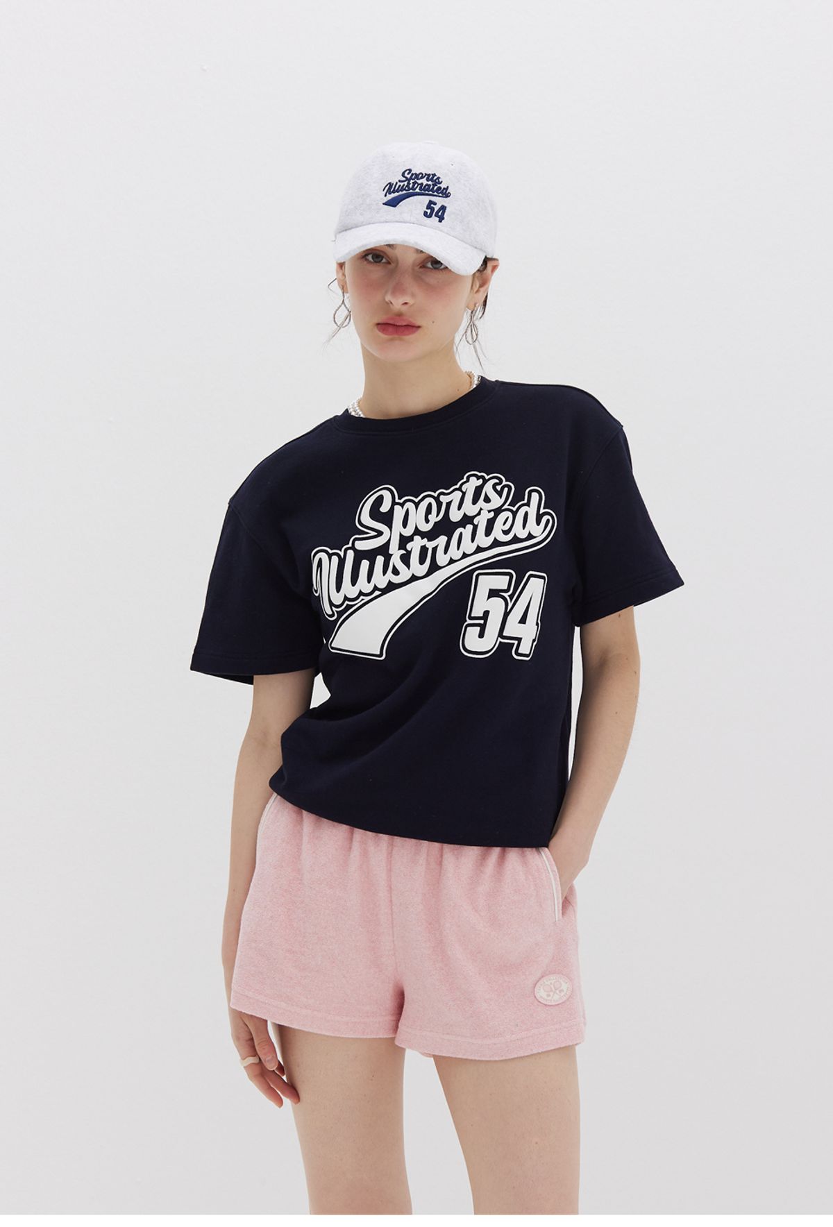 스포츠 일러스트레이티드(SPORTS ILLUSTRATED) TENNIS WOMEN ICON LOGO HALF PANTS (PINK)
