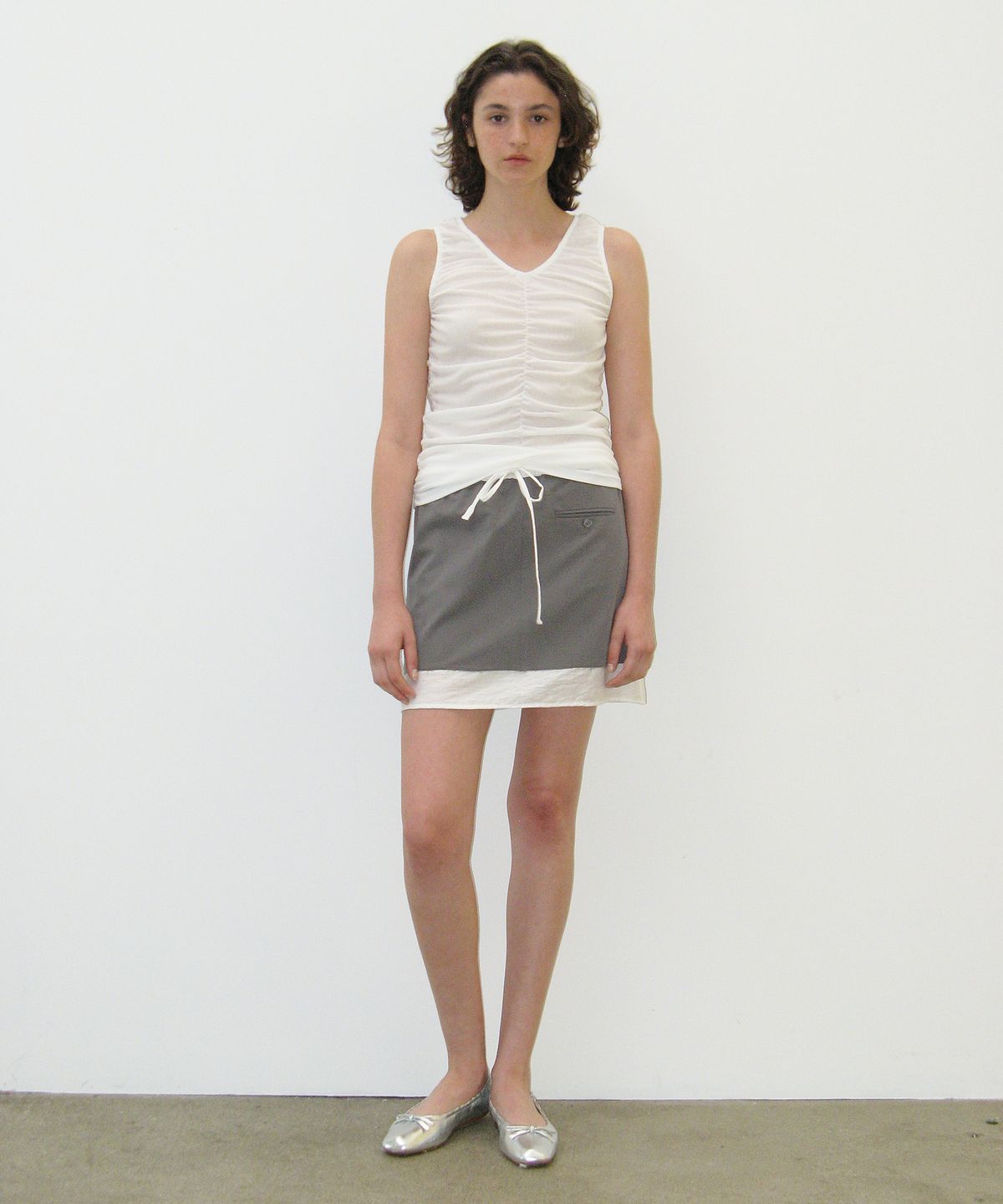 카셀(CACELE) RAW CUT LAYERED SKIRT, GRAY