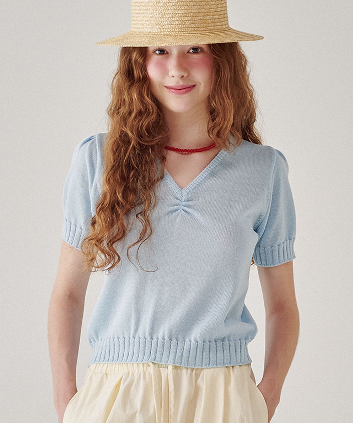 론론(RONRON) SHIRRING POINTED V NECK SHORT KNIT SOFT BLUE