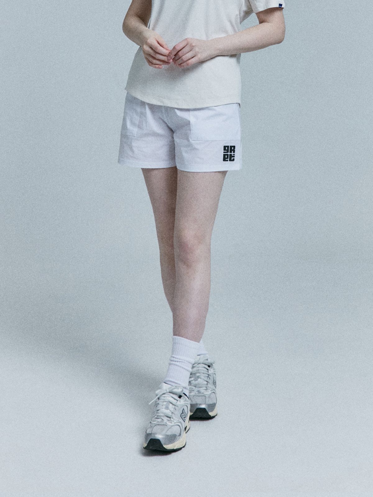 그라운즈스웻(GROUNDSSWET) 스카치 이니셜 로고 믹스 반바지
