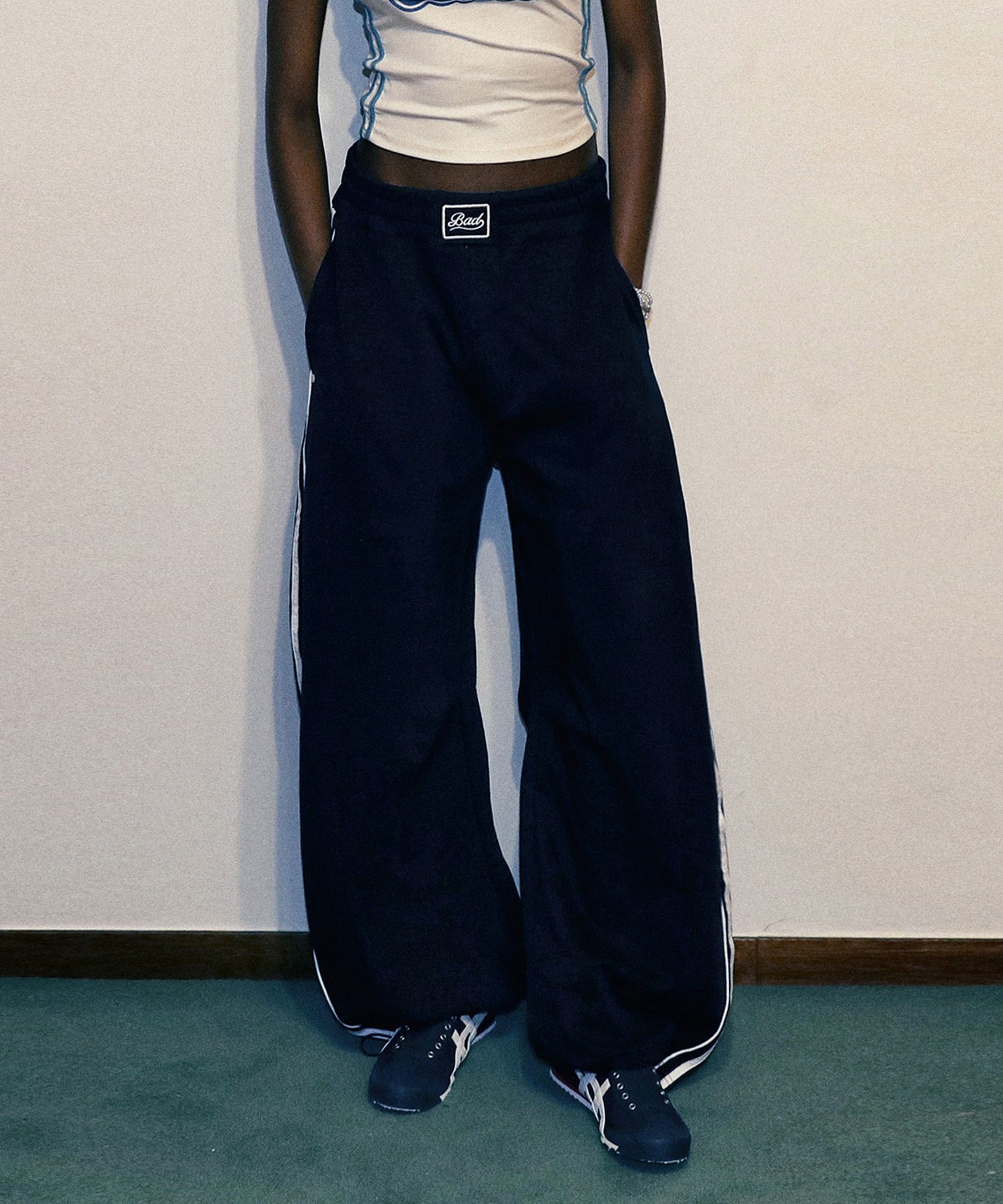 ★送料・関税込★BADBLOOD★Billy 2 Way Curved Jogger Trousers BAD BLOOD Billy 2 Way Curved Jogger Trousers - Red – SeoulSeoul