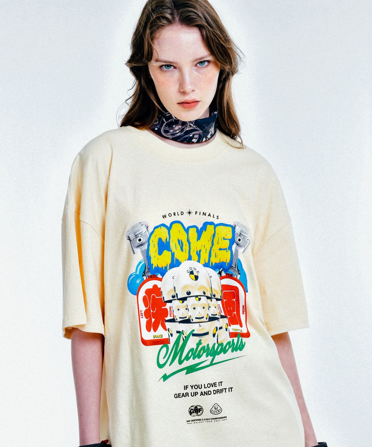씨오엠이(COME) [UNISEX] C.O.M.E Motorsports Oversized Printed Cotton-Jersey T-Shirt (Beige)