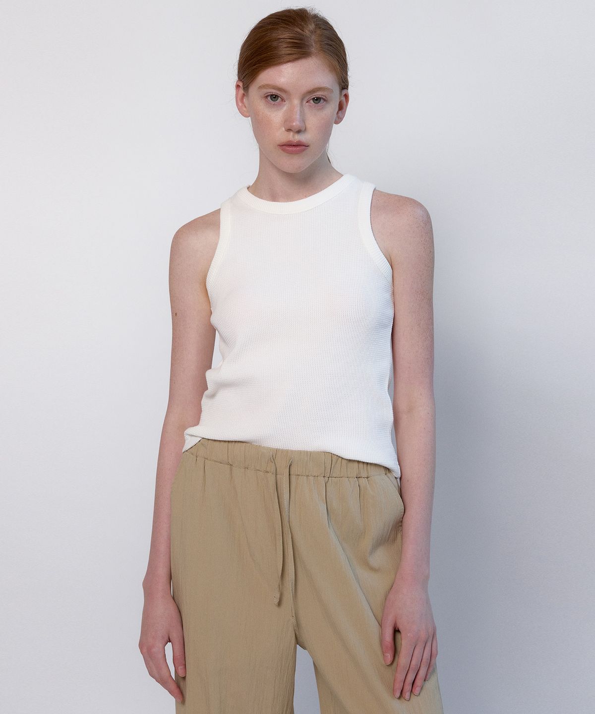 네벨에브리웨어(NEBELEVERYWEAR) Waffle Sleeveless Top (4 Color)