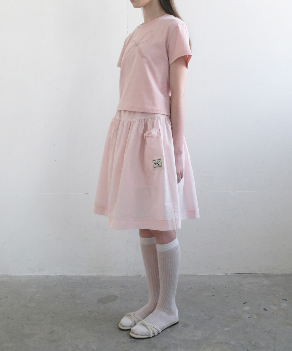유베이지(UBEIGE) 시어서커 리본 포켓 스커트 (Pink)
