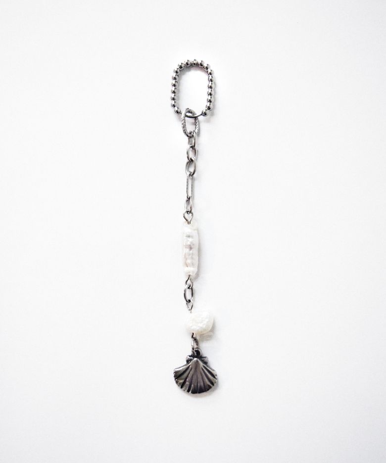 Pearl of seashell charm