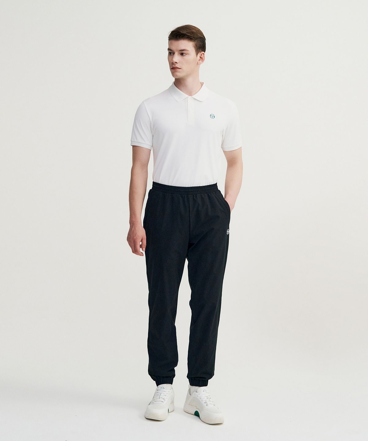 세르지오 타키니(SERGIO TACCHINI) M 에센셜 웜업 조거 팬츠 (Black)