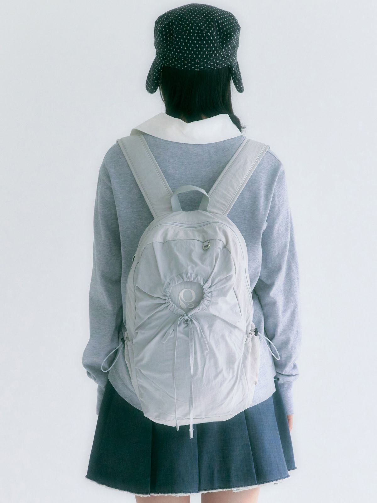 포이에(POIE) hole string PO backpack (light gray)