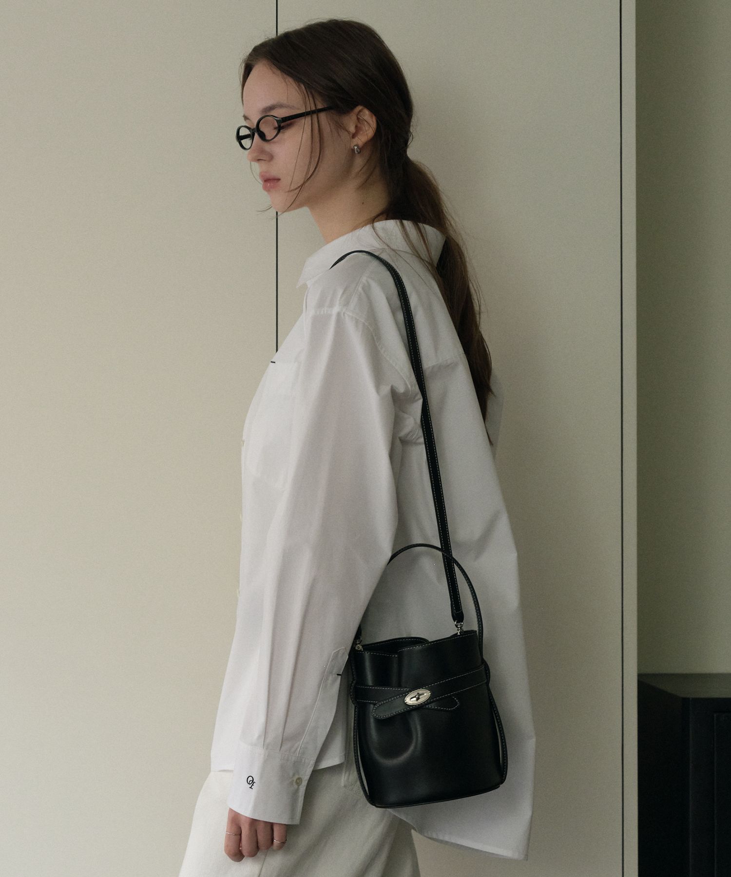 MUSINSA | OSTKAKA Classic Belt Bucket Bag Mini Black