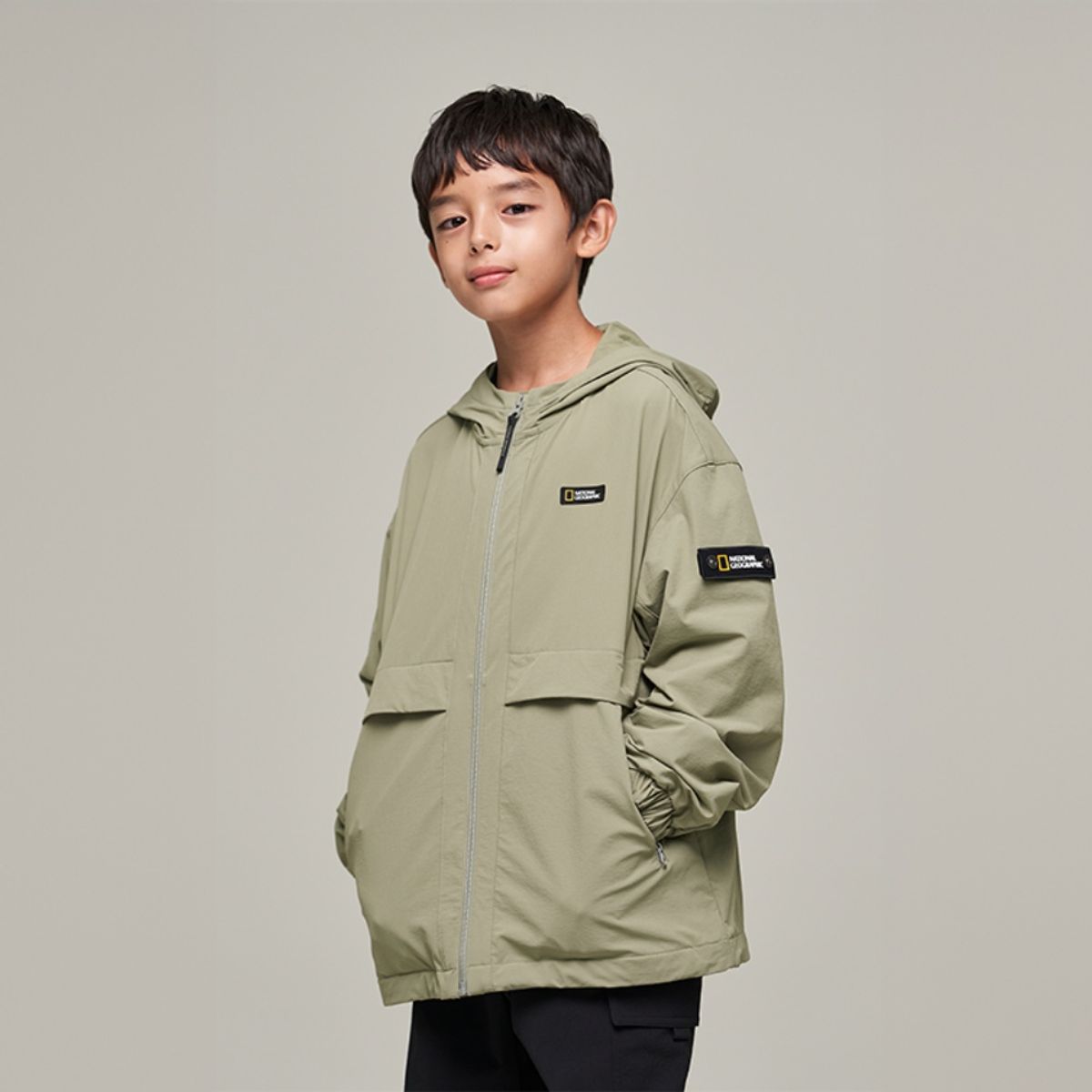 내셔널지오그래픽 키즈(NATIONAL GEOGRAPHIC KIDS) K243UJP940 판테라 우븐 트레이닝 점퍼 LIGHTKHAKI