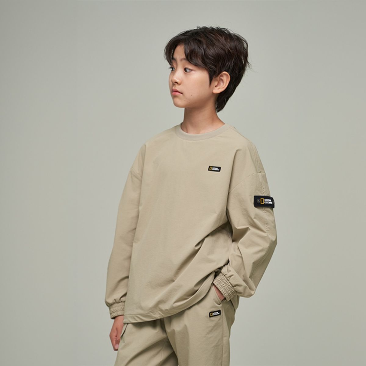 내셔널지오그래픽 키즈(NATIONAL GEOGRAPHIC KIDS) K243USW940 판테라 우븐 맨투맨 BEIGE