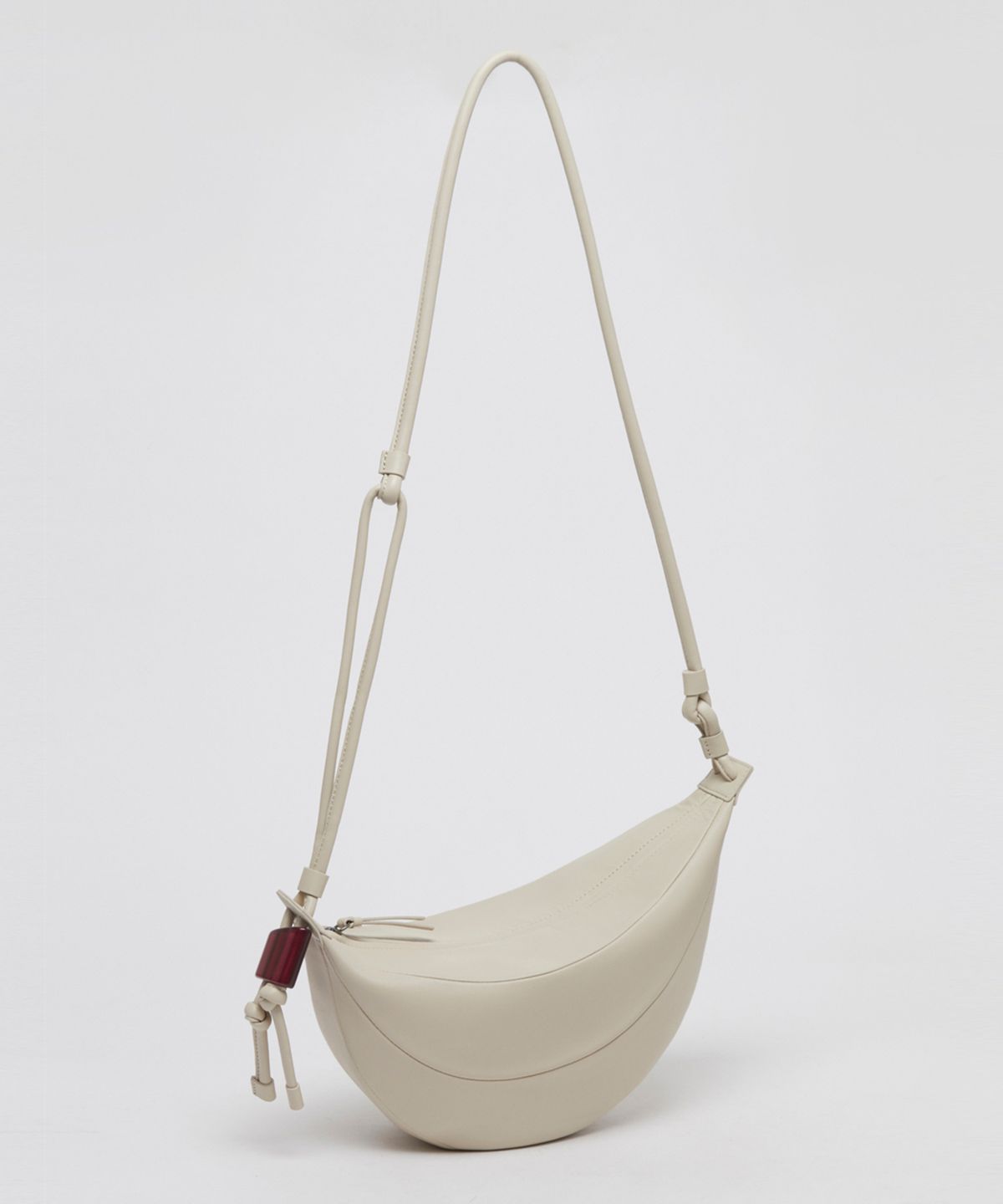 아카이브앱크(ARCHIVEPKE) Fling bag(Cream)_OVBAX25002CRR