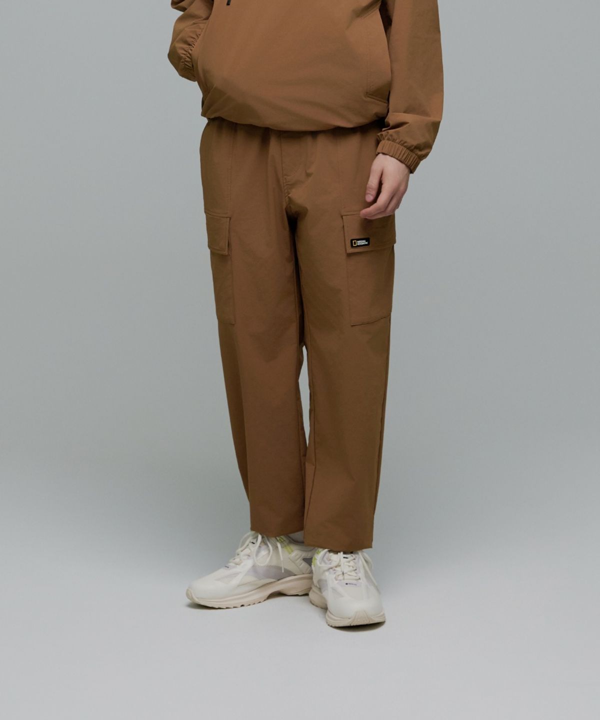 내셔널지오그래픽(NATIONALGEOGRAPHIC) N243UPT931 아르켈론 우븐 스트레치 조거 팬츠 S ORANGE