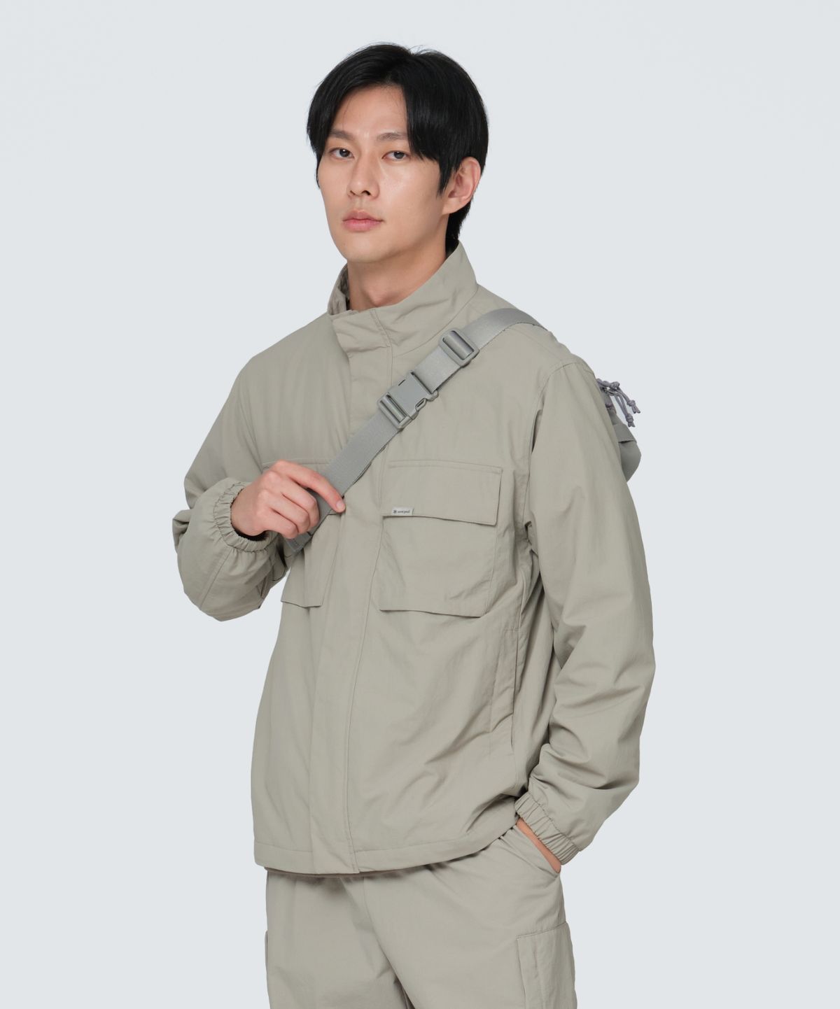 스노우피크 어패럴(SNOWPEAK APPAREL) 캠플 스탠드넥 바람막이 (S24FMCWB14) Beige Gray