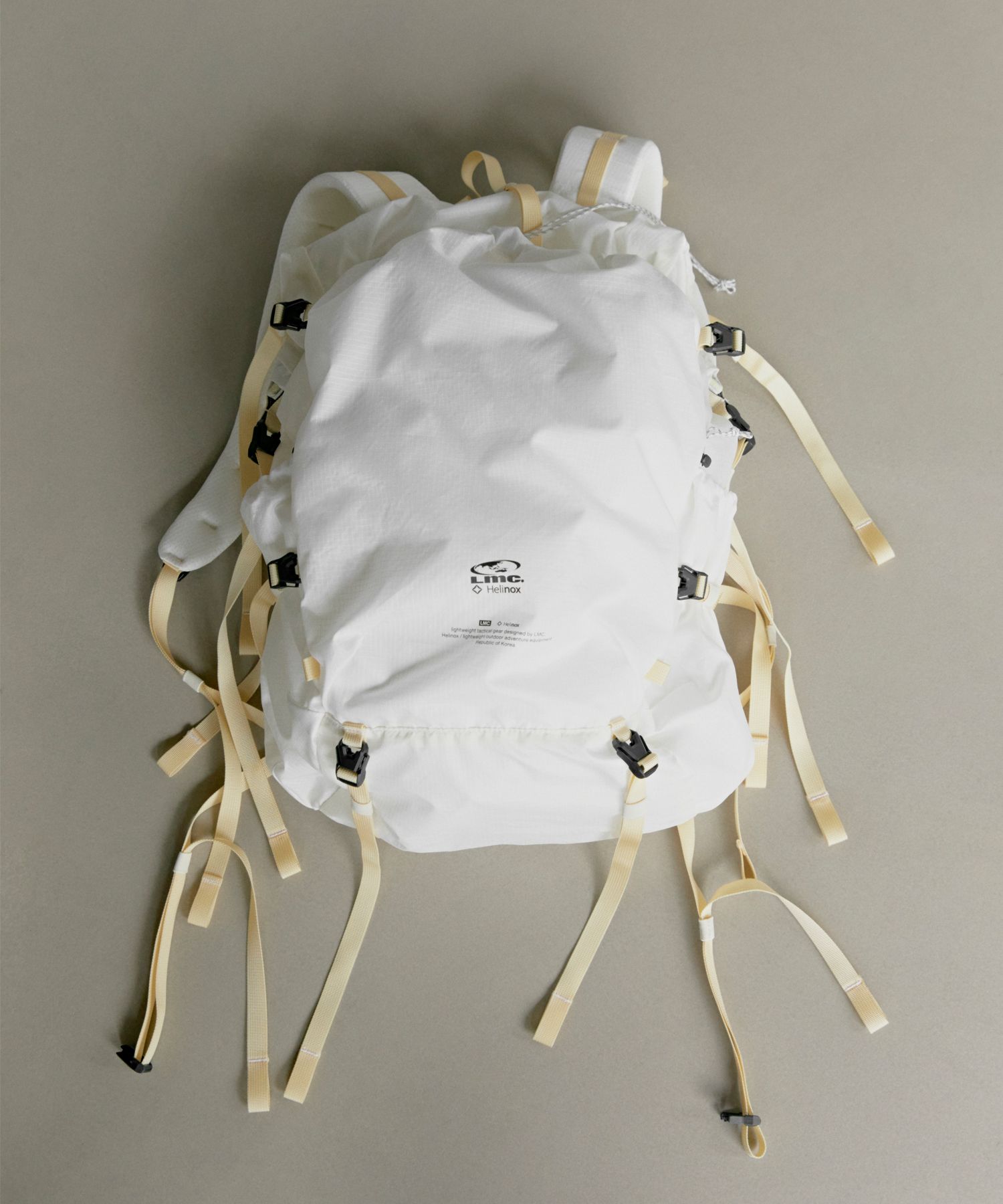 MUSINSA公式 | LMC LMC x HELINOX LIGHT ROLL TOP BACKPACK white