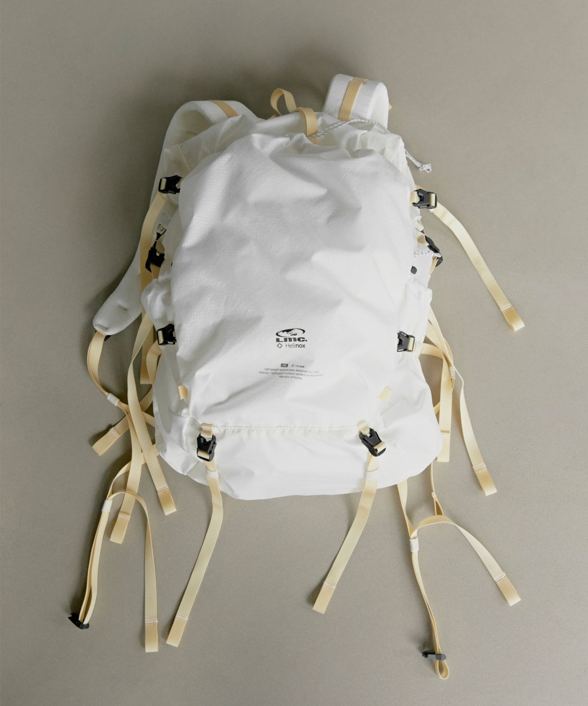 엘엠씨(LMC) LMC x HELINOX LIGHT ROLL TOP BACKPACK white