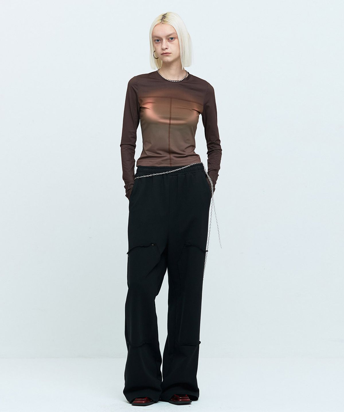 메아(MEA) ECLIPSE THUMBHOLE TOP [BROWN]