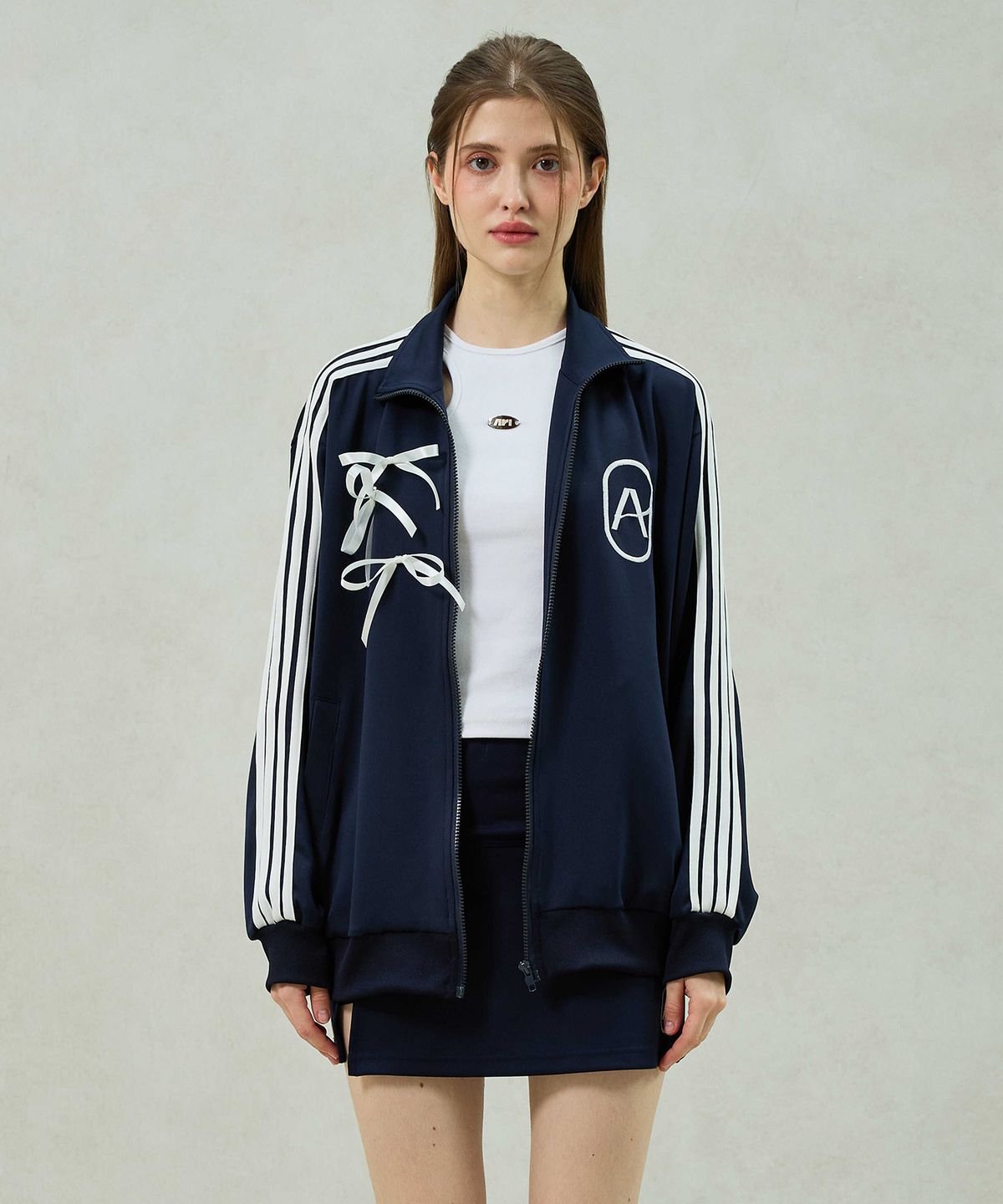 아리킴(ARIKIM) A RIBBON TRACK TOP / NAVY