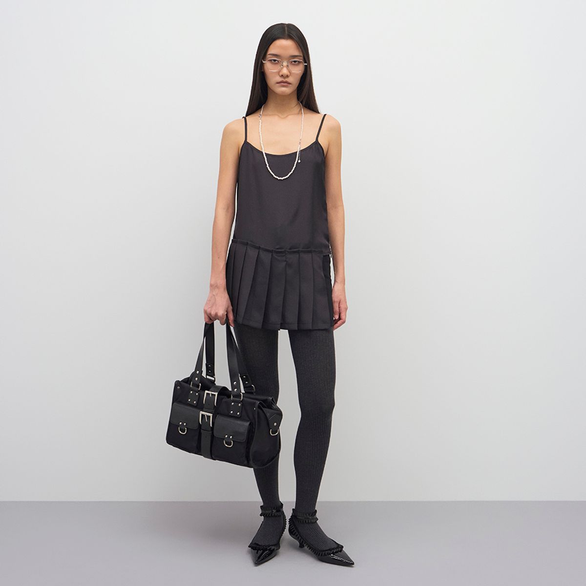 엘씨디씨티엠(LCDC™) UNBALANCED PLEATS SLEEVELESS TOP