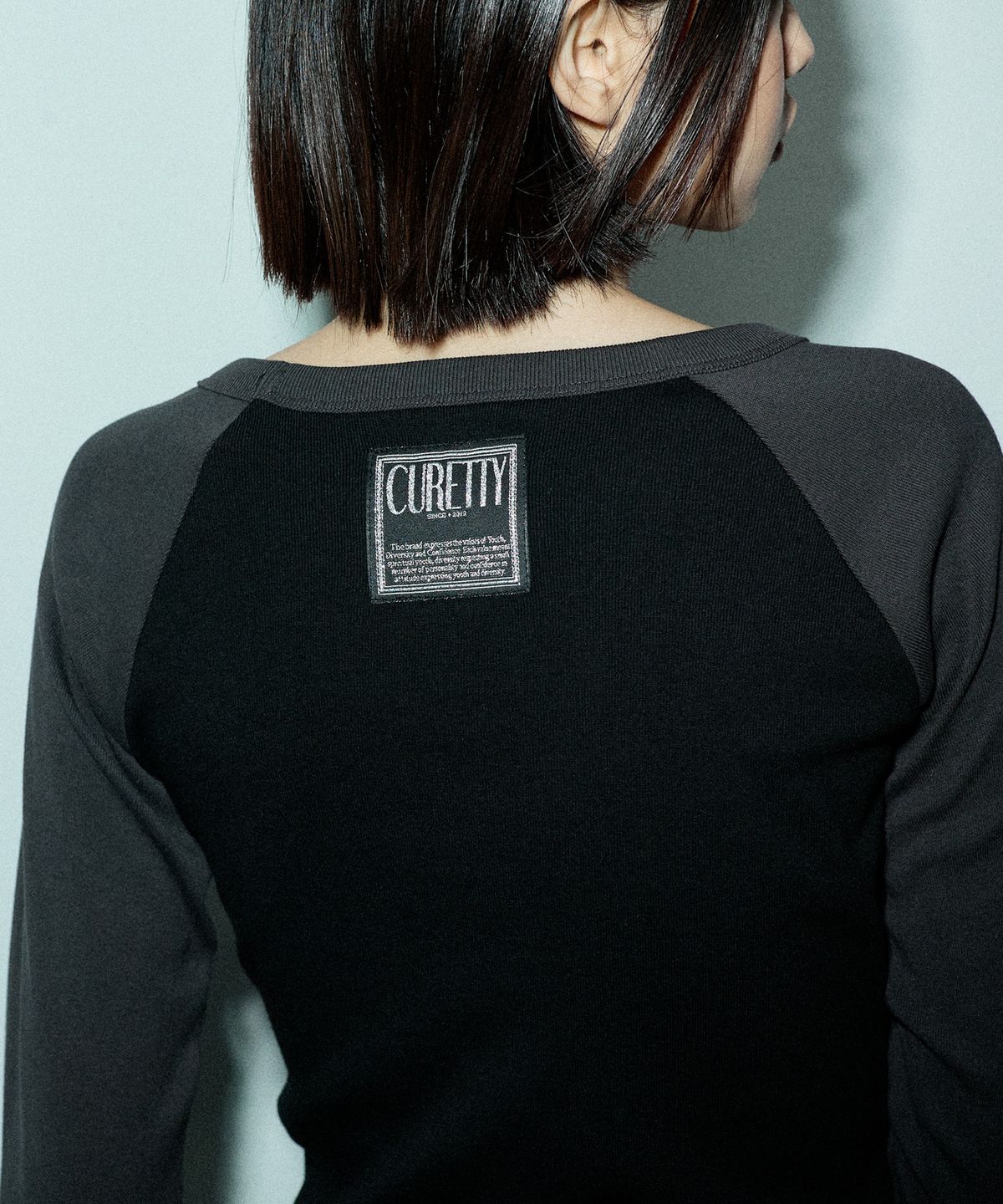 큐리티(CURETTY) C RAGLAN LONG SLEEVE T-SHIRT_BLACK