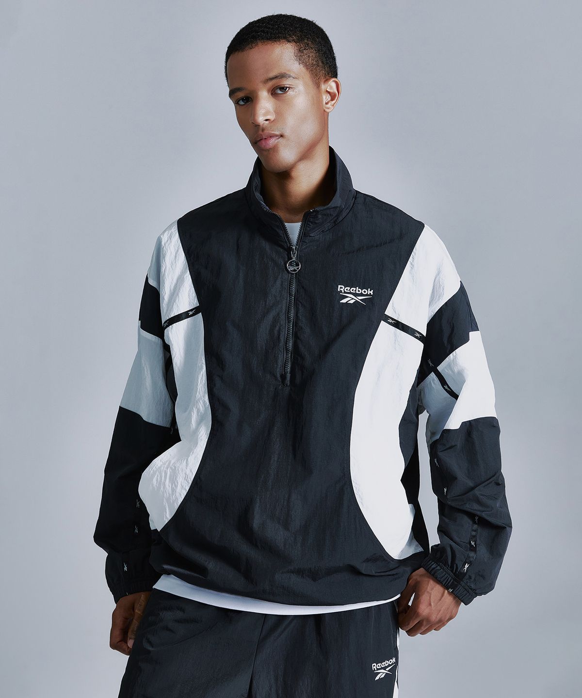 리복(REEBOK) 라이벌 더블 커브 아노락 - 블랙