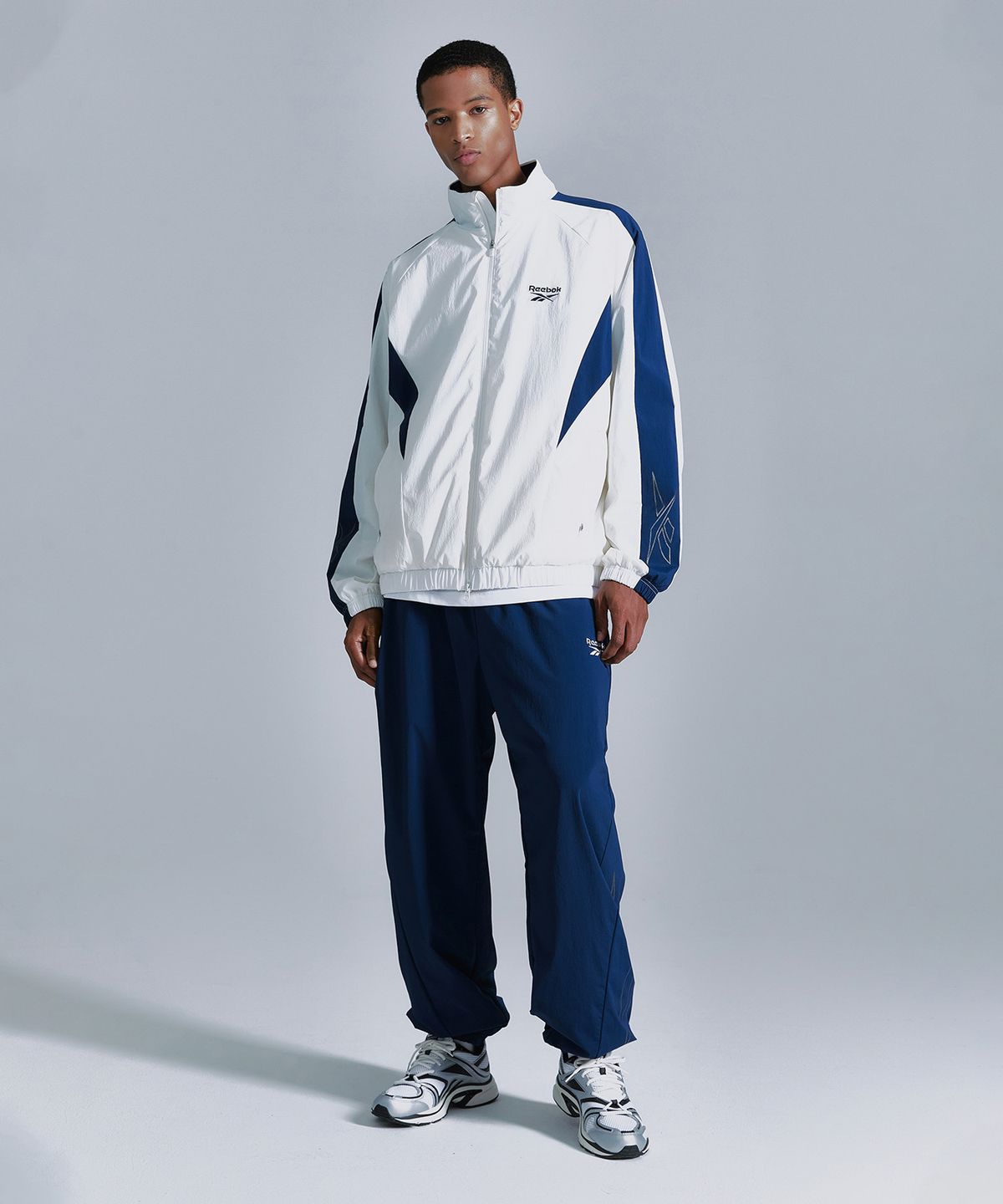 리복(REEBOK) 플로우 웜업 조거 팬츠 - 네이비