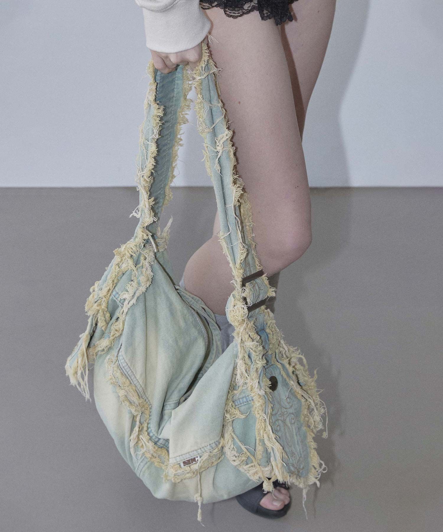 MUSINSA | SCULPTOR Destroyed Denim Duffel Bag Vintage Ice