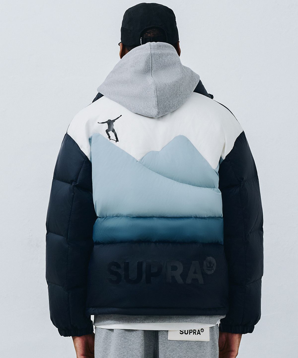 수프라(SUPRA) 백 그래픽 숏 다운 자켓(NAVY)