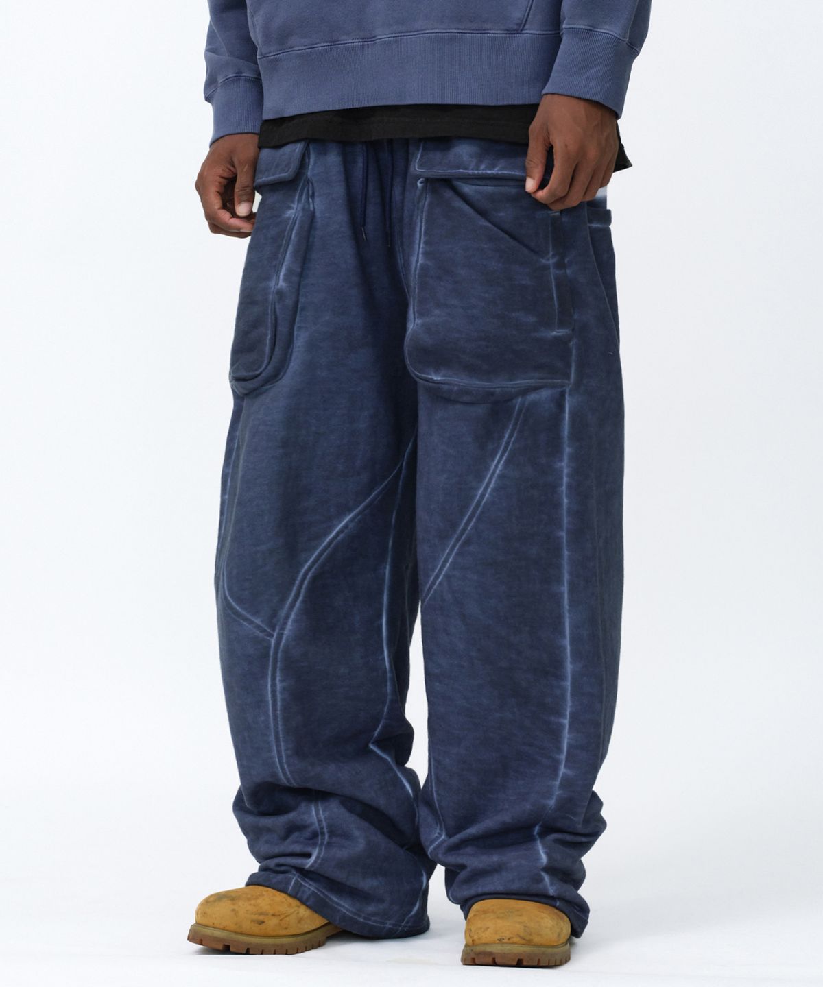스웨이드(SUADE) CUT OUT SWEAT PANTS [NAVY]