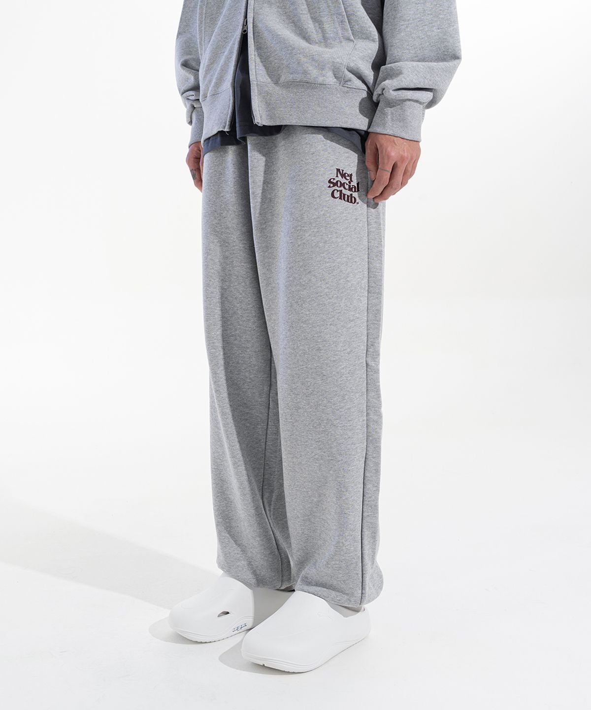 넷소셜클럽(NET SOCIAL CLUB) WAVY LOGO JOGGER PANTS (MELANGE)
