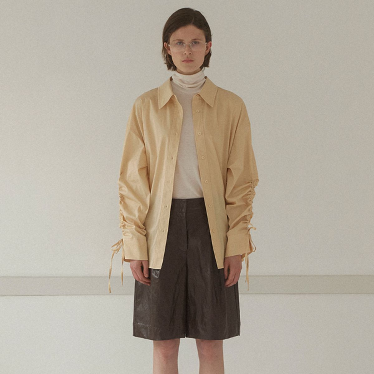 아틀리에 나인(ATELIER NAIN) STRING SLEEVE OVERFIT SHIRT(BL-4258)