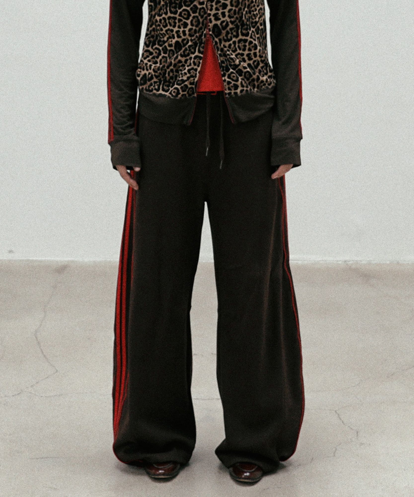 MUSINSA | BADBLOOD Billy 2 Way Curved Jogger Trousers