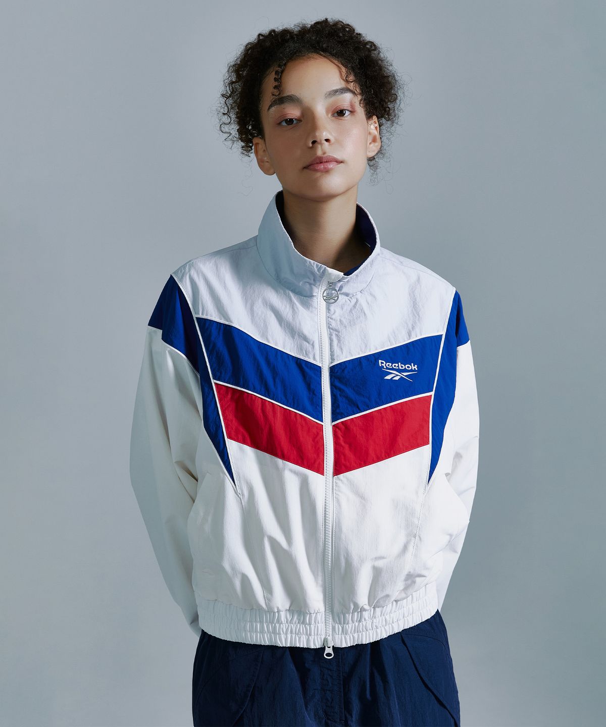 리복(REEBOK) 헤리티지 크롭 윈드 브레이커 (W) - 화이트
