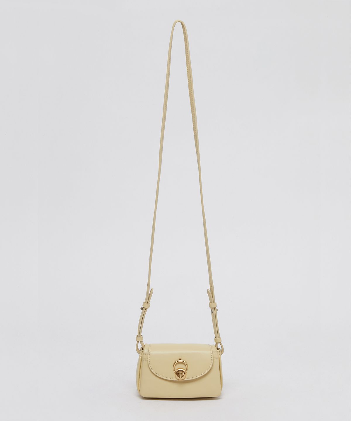 아카이브앱크(ARCHIVEPKE) Luv hole mini bag(Butter)_OVBRX24511BTT