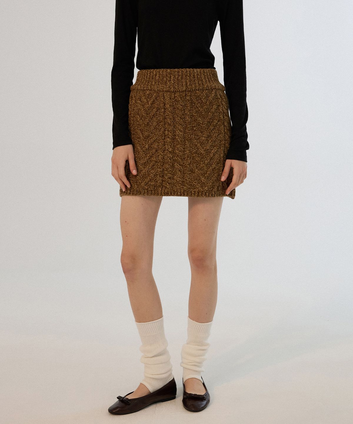 썸웨어버터(SOMEWHEREBUTTER) Colleen Cable Knit Skirt - Brown