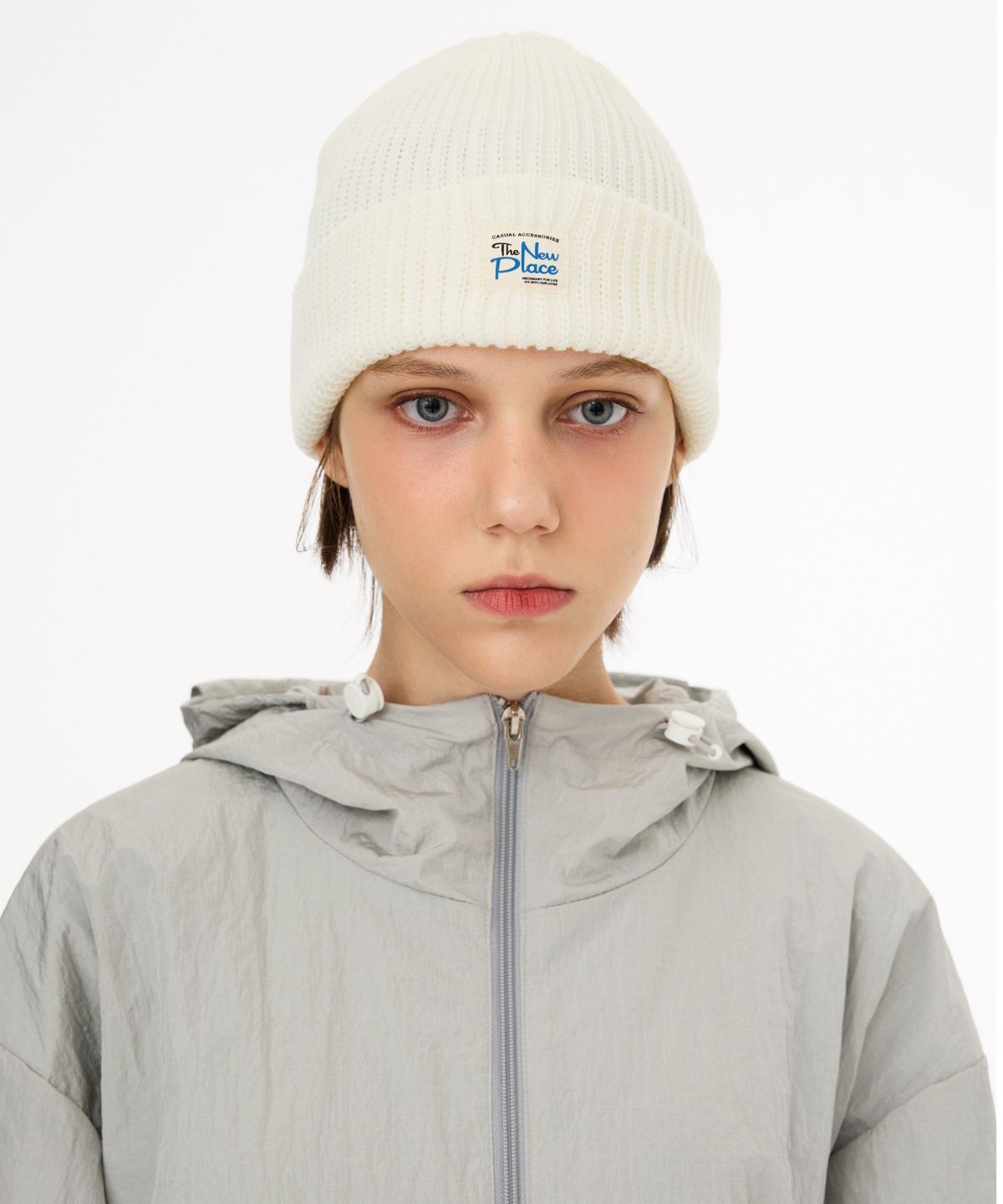 티엔피(TNP) T242AACUZZT59_TAG SIGN BEANIE - IVORY