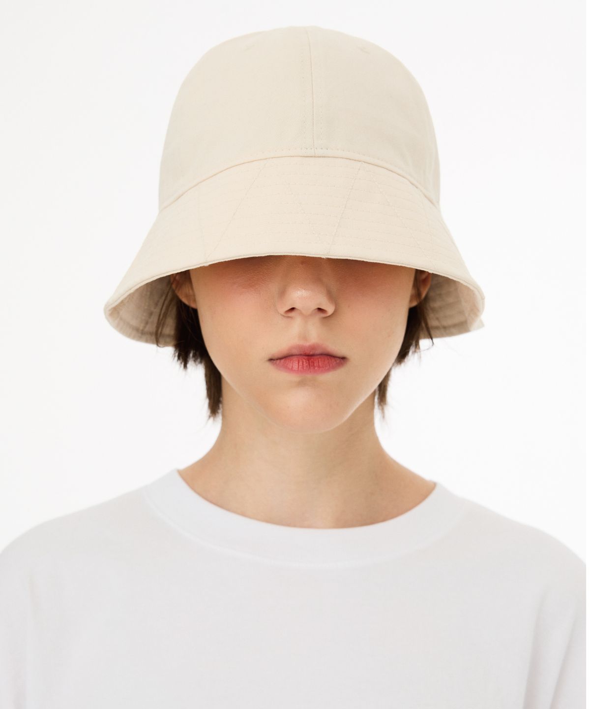 티엔피(TNP) T242AACUZZT61_BACK AND FORTH BUCKET HAT - IVORY
