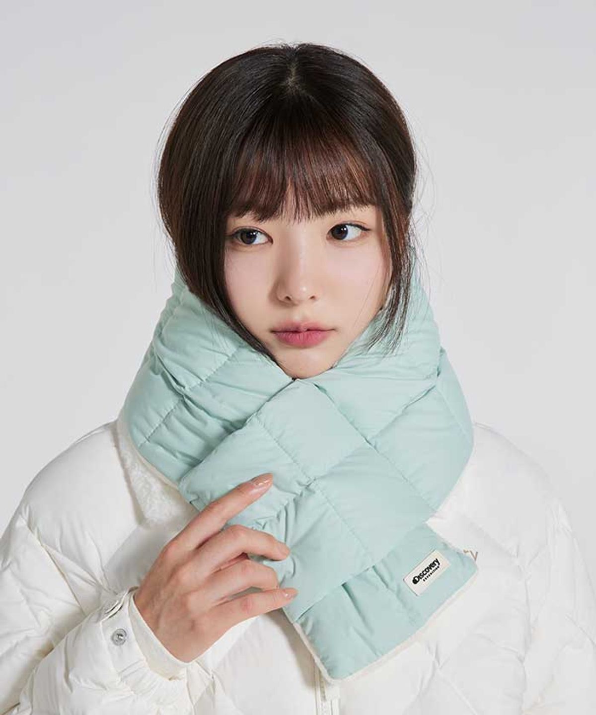 디스커버리 익스페디션(DISCOVERY EXPEDITION) 디하스 스퀘어 퀼팅 패커블 머플러 (L/MINT)