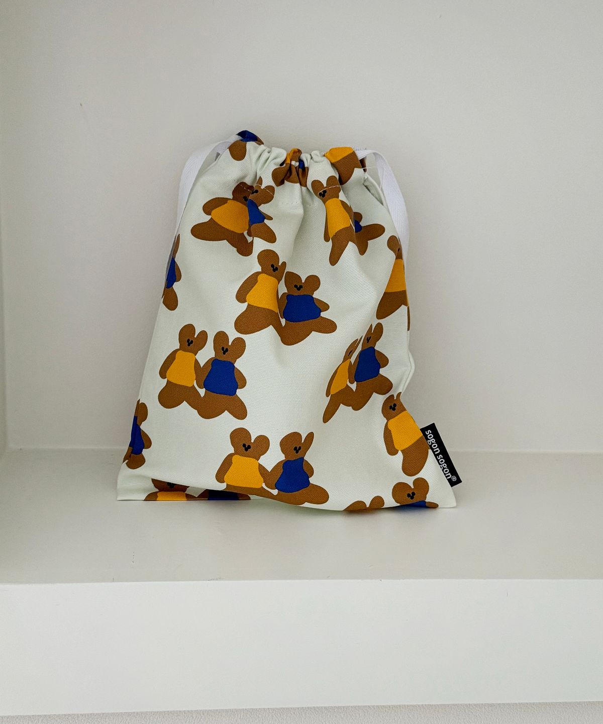 소곤소곤(SOGONSOGON) friend string pouch m