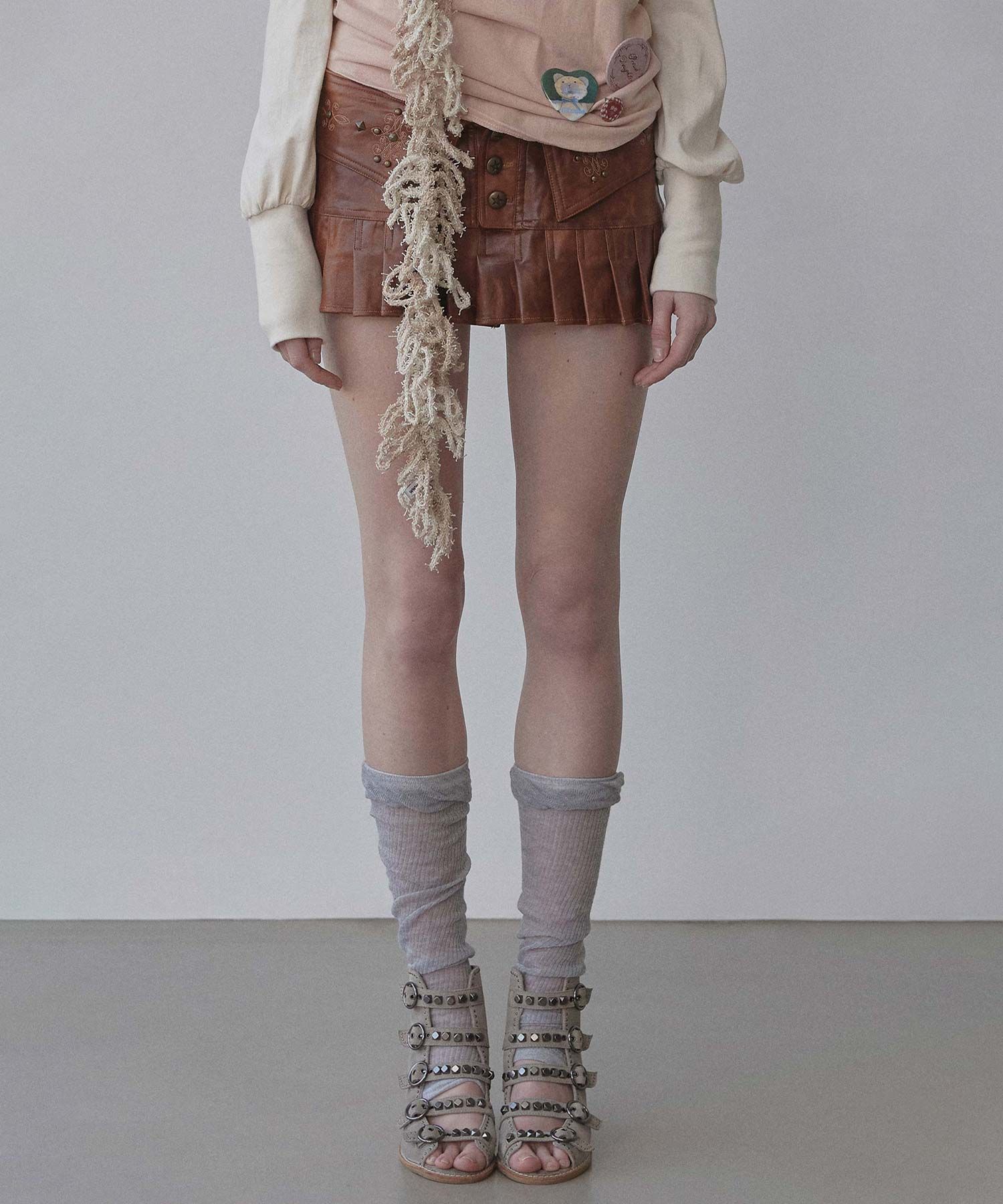 MUSINSA | SCULPTOR Western Faux Leather Micro Skirt Red Brown