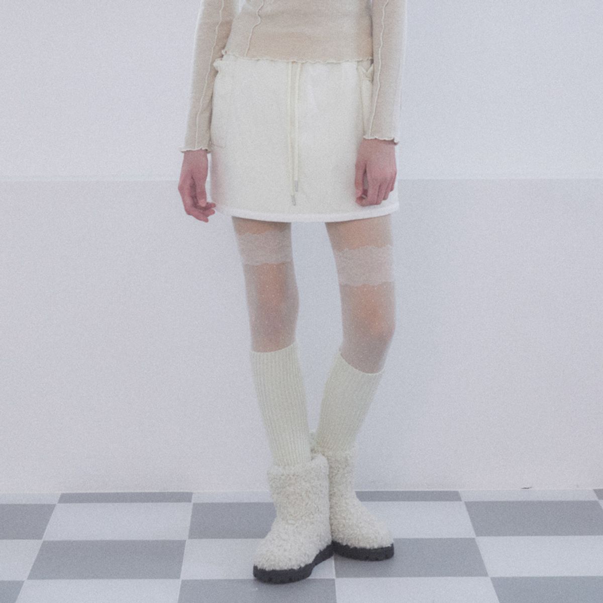 델리센트(DELICCENT) 패딩 미니 스커트 [IVORY]