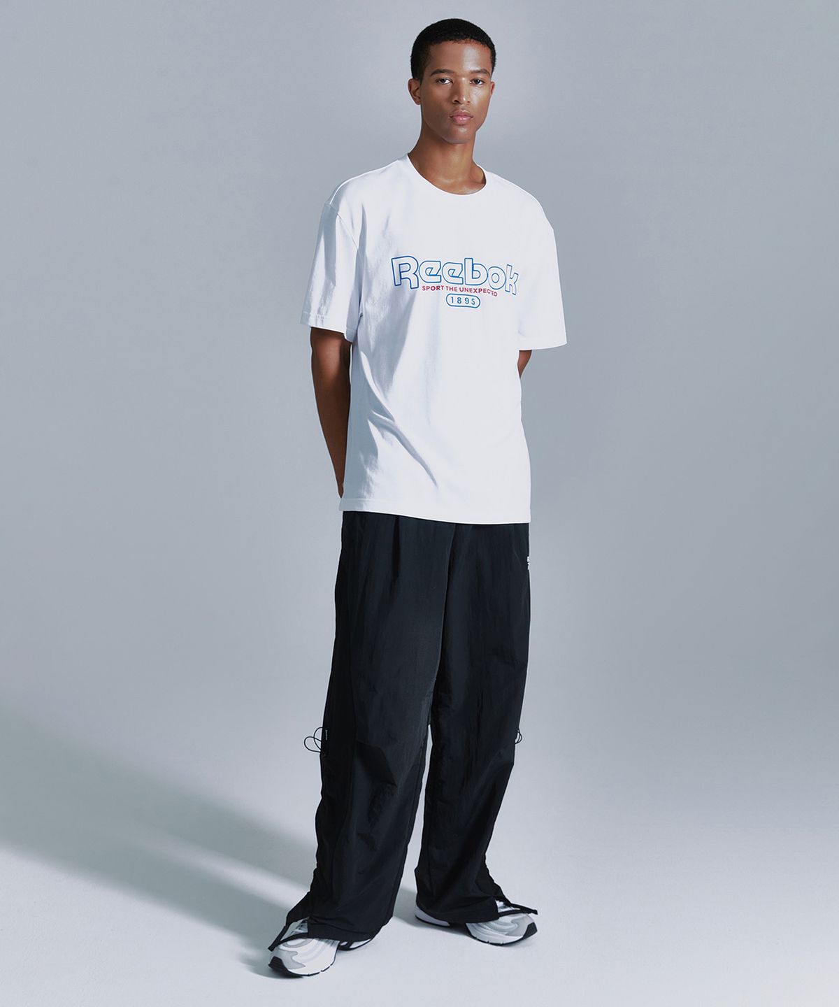리복(REEBOK) 라이벌 립스탑 와이드 팬츠 - 블랙