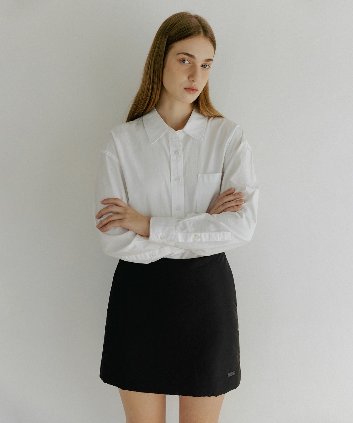 튜드먼트(TTUDEMENT) PADDED MINI SKIRT BLACK