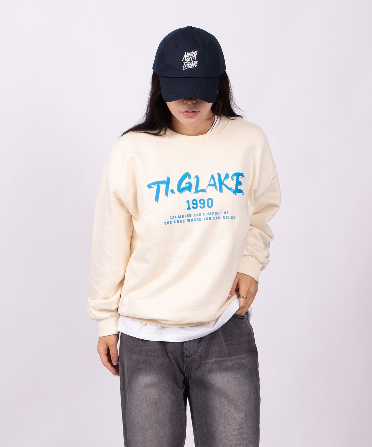 티글레이크(TI.GLAKE) 티글레이크1990 오버핏 쭈리 맨투맨 티셔츠 크림