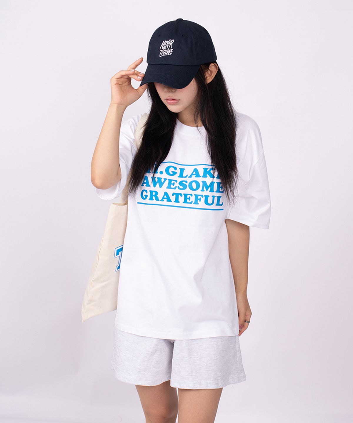 티글레이크(TI.GLAKE) 어썸로고 오버핏 반팔티셔츠 화이트