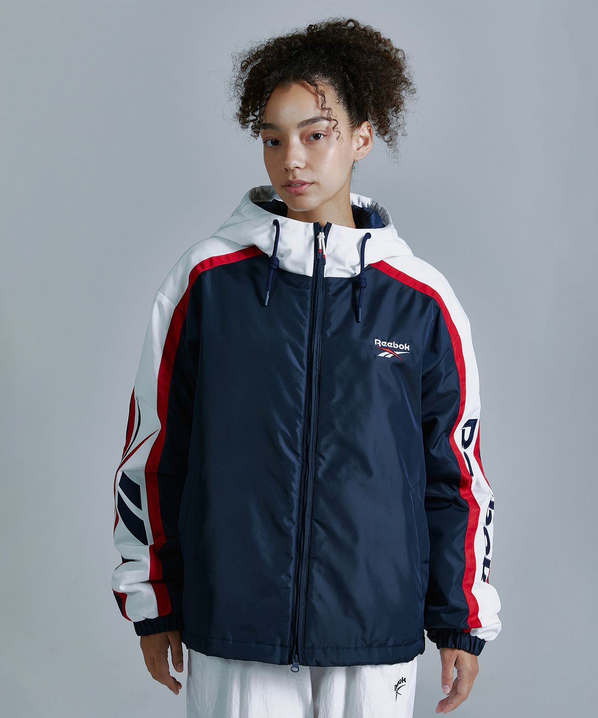 리복(REEBOK) 벡터 패널드 패딩 자켓 - 네이비